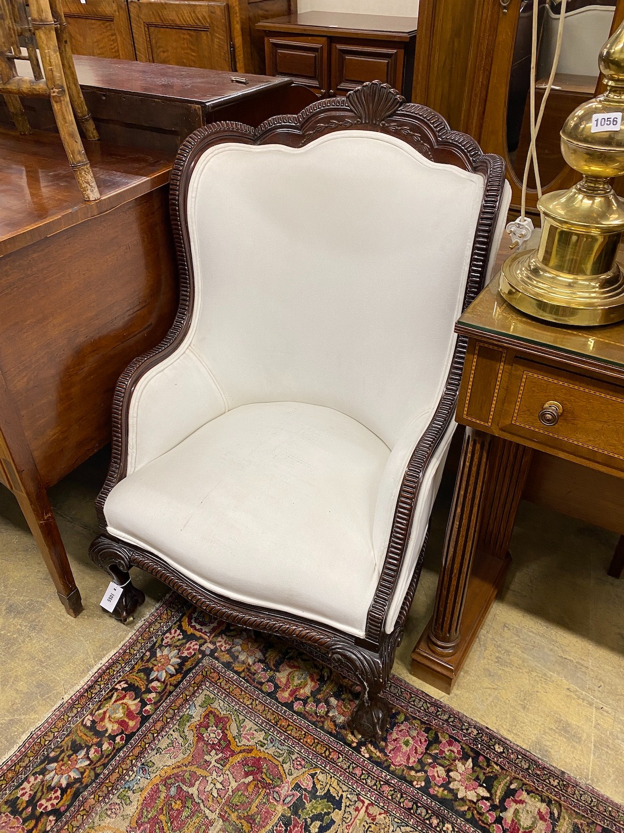 A Victorian carved mahogany armchair, width 70cm, depth 66cm, height 110cm